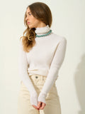 SUZIE pull col roulé neige