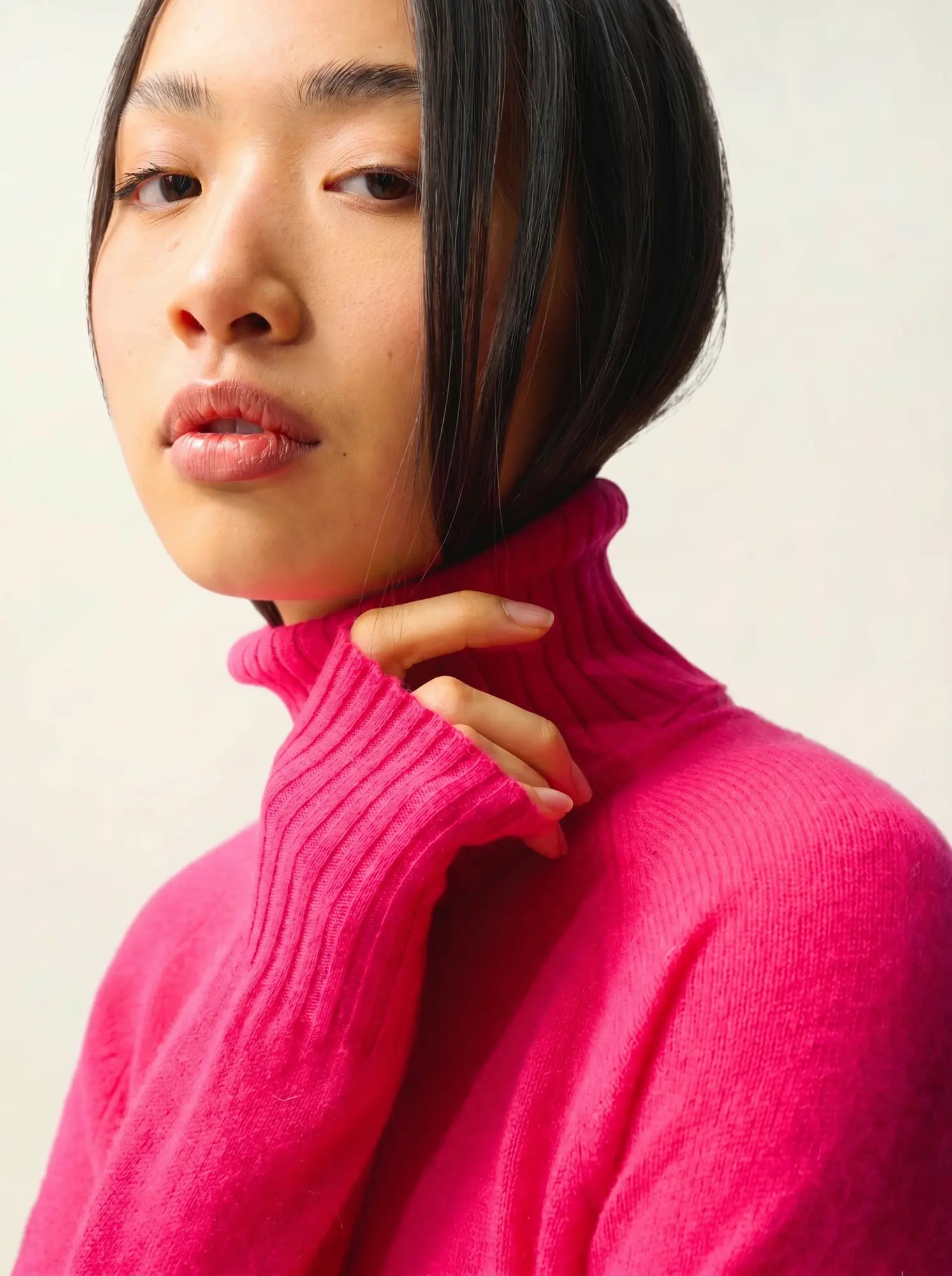 CASSY pull col roulé fuchsia